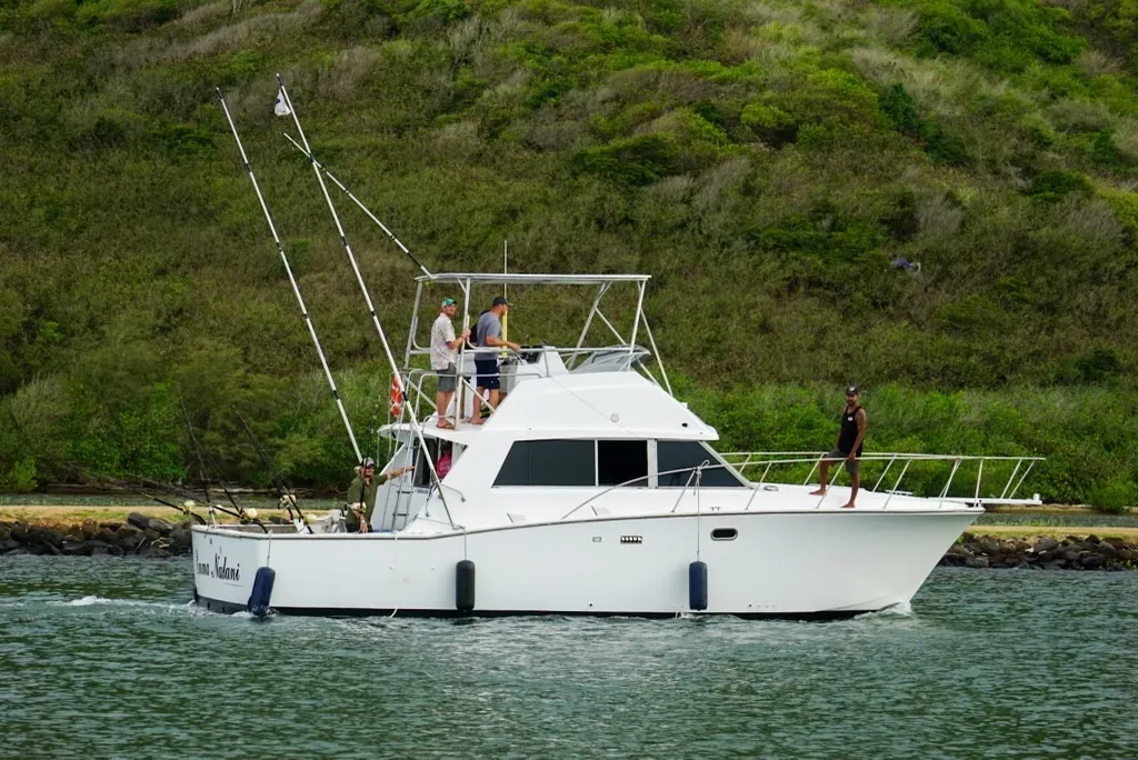 Crew and guests after a great day of fishing on the Emma Nalani