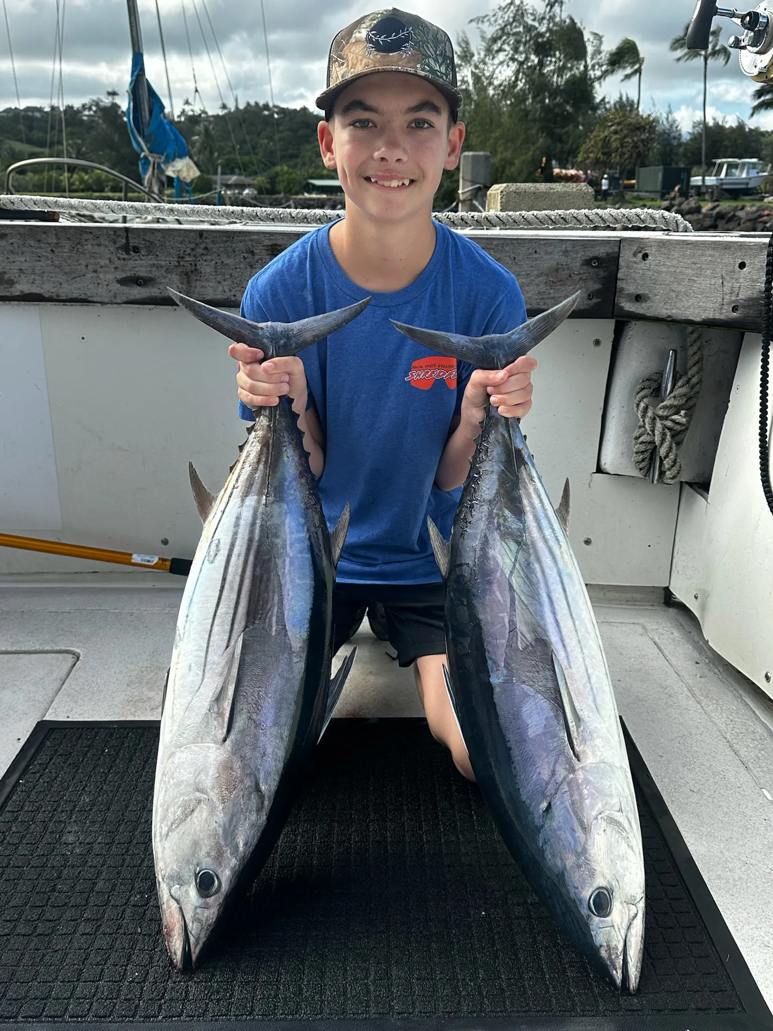 Pacific blue marlin alongside the Emma Nalani offshore Kauai